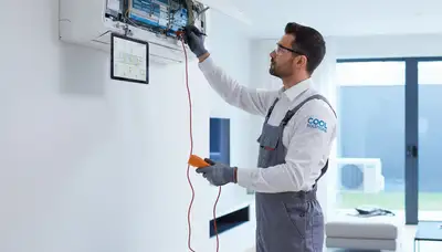 Technician performing AC repair service in Atlanta, GA for Five Star Cooling HVAC experts